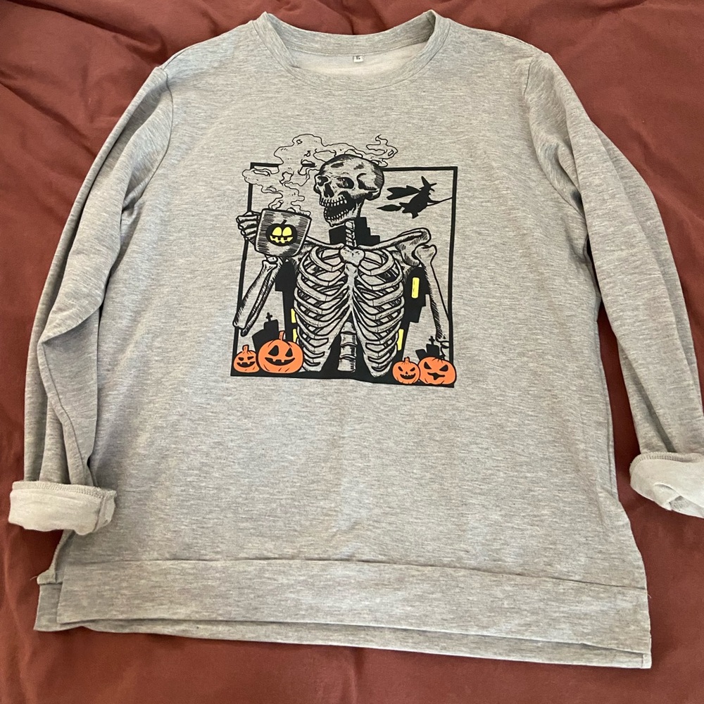 Skeleton sipping coffee crewneck